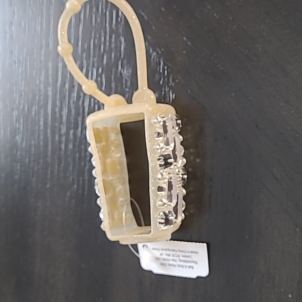 Hand sanitizer holder